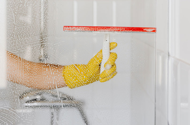 how to remove hard water stains from glass